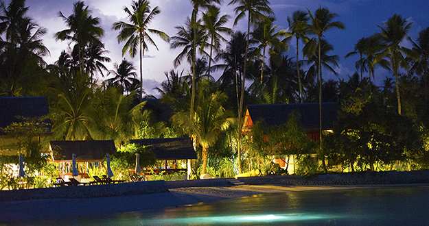 night divers and snorkelers can delve into the shadows right from the beach by the Dive Center. 