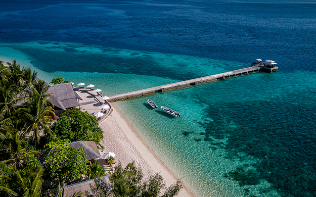 Wakatobi's expansive House Reef starts right off the resort beach, and has been named the World's Best Shore Dive. Dives can begin right from shore or the resort pier. 