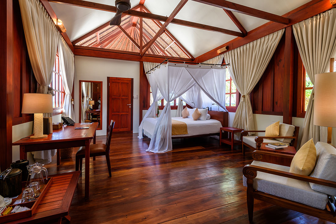 Interiors feature rich woodwork and include a full range of modern comforts. Sleeping and relaxation spaces are some 20 percent larger than the resort’s signature Ocean Bungalows. Photo by Waktobi Resort