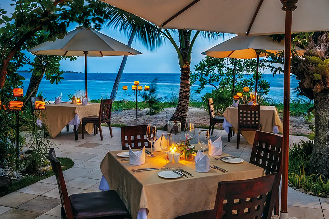 Out side on the patio deck with ocean view at Wakatobi's Restaurant.